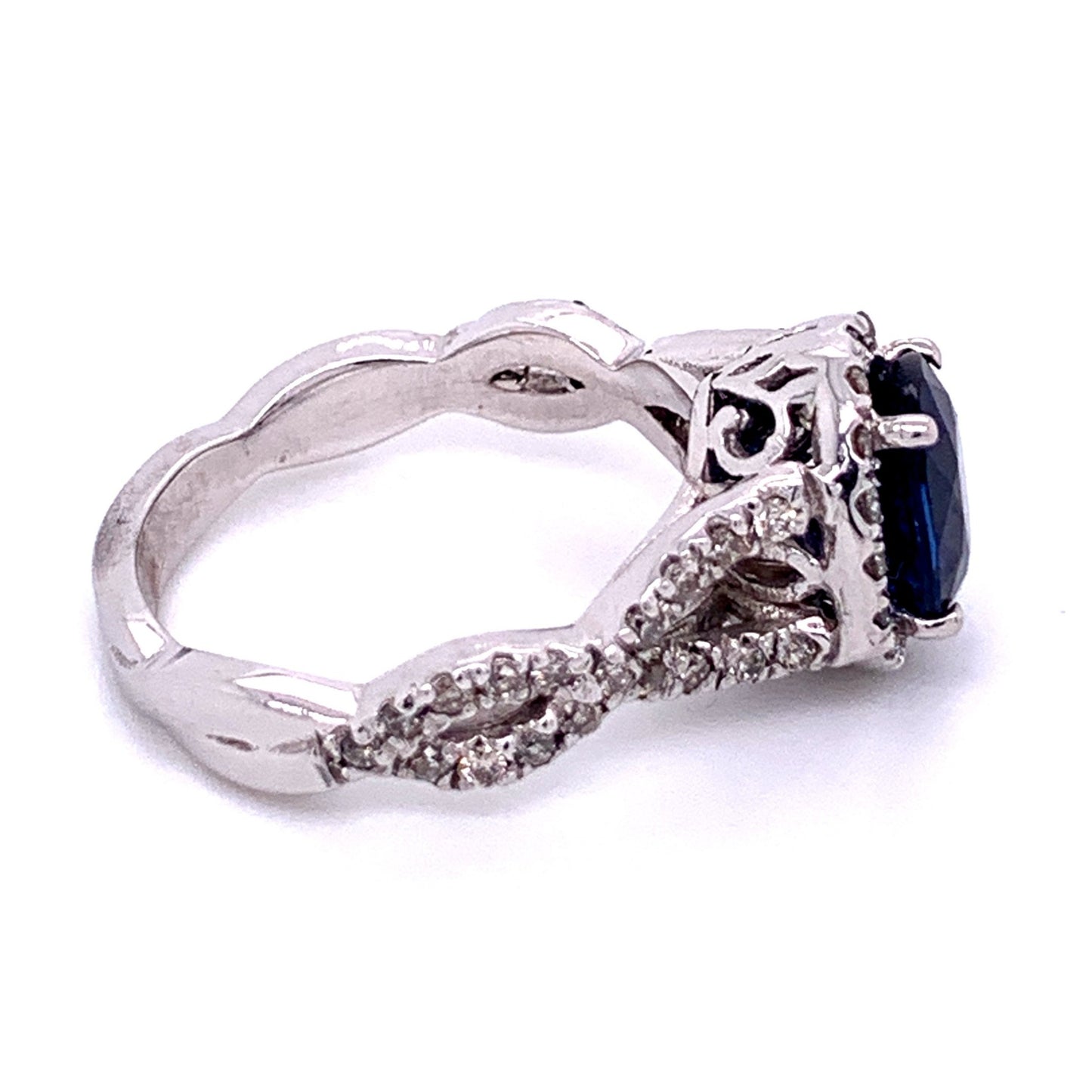 Oval Sapphire and Diamond Halo Ring in 14K White Gold