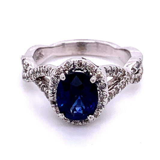 Oval Sapphire and Diamond Halo Ring in 14K White Gold